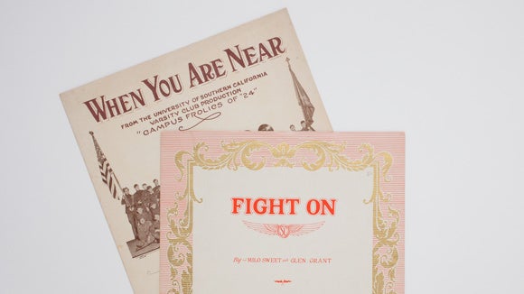 Examples from the University Archives, including a "Fight On" songbook.